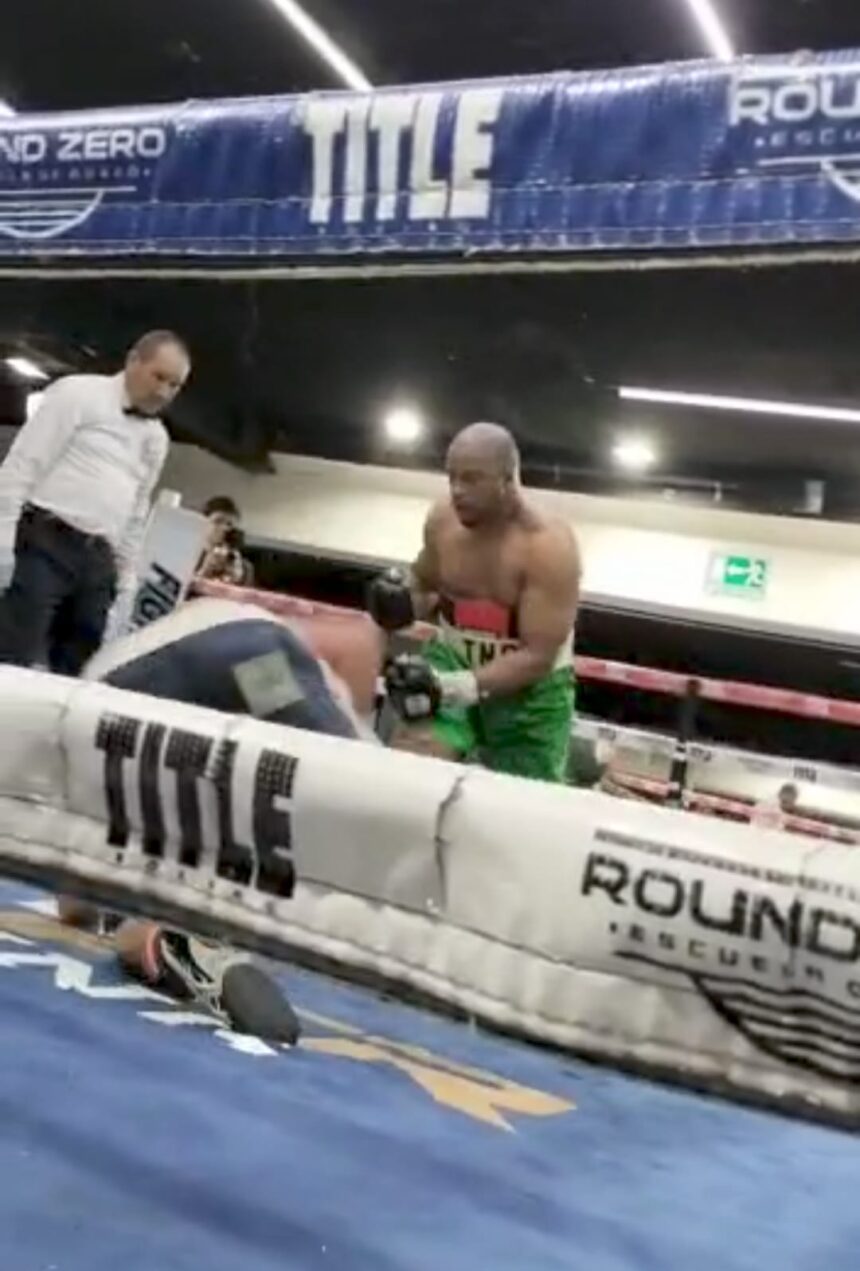 Enobong "The Nigerian Gentleman" Umohette flooring Silva in the 3rd round. PHOTO: Ace Media productions