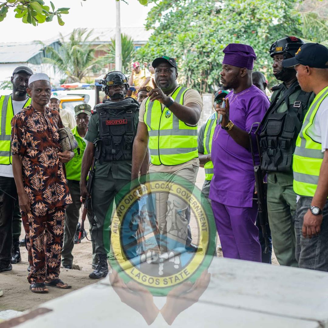 R-L: Hon. Egobi Osagie Daniel, Executive Chairman AOLG Prince Lanre Sanusi addressing residents during the clearance of the shanties.