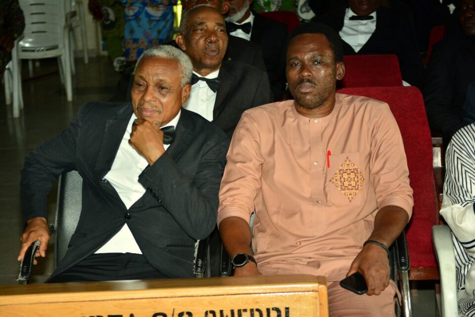 Sir Eva Njemanze with his son during the Vigil Mass
